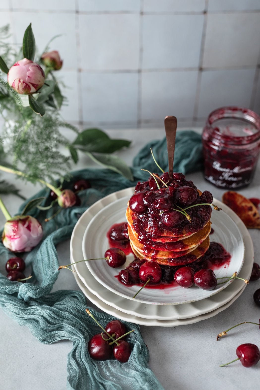 Poppy pancakes with cherry compote