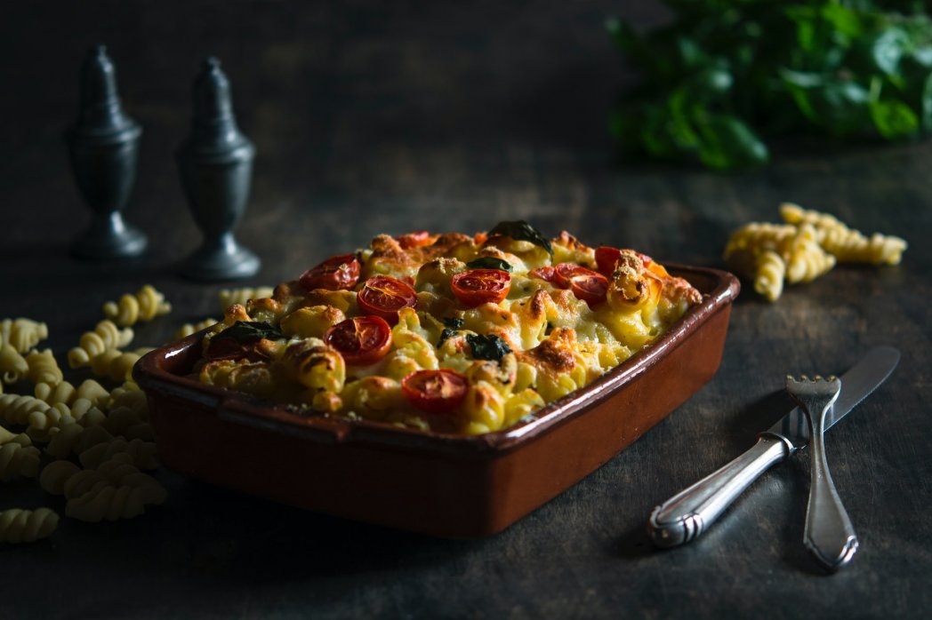 Baked pasta with zucchini and tomatoes