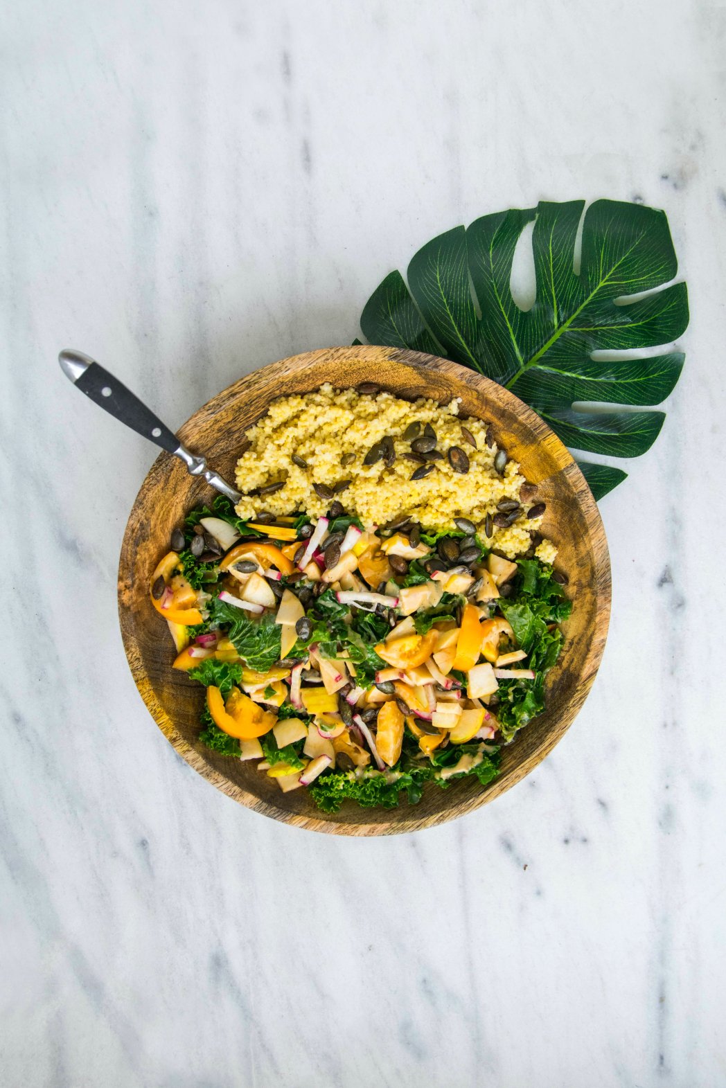 Couscous salad with kale and pumpkin seeds